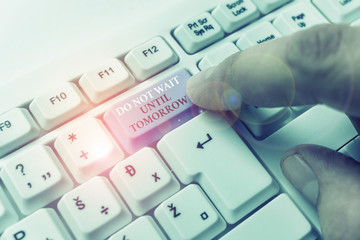 Conceptual hand writing showing Do Not Wait Until Tomorrow. Concept meaning needed to do it right...