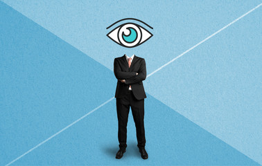 headless businessman with an eye symbol on paper background