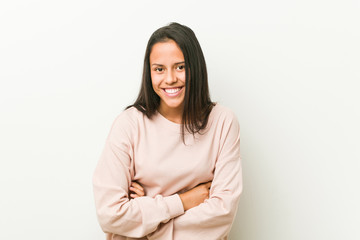 Young cute hispanic teenager woman laughing and having fun.