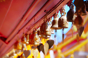 Small bells hang on roof in the temple