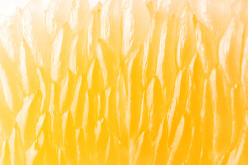 Bright juicy citrus pulp close-up. High-quality image is suitable for topics: healthy lifestyle, vitamins, proper nutrition, diet, summer, fresh juices. Background fruit texture. - obrazy, fototapety, plakaty