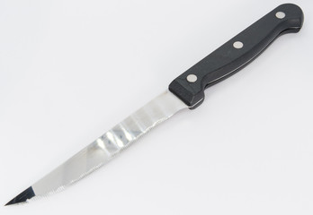 Knife with black plastic handle