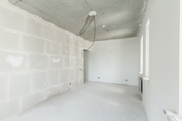 Russia, Moscow- May 21, 2019: interior room apartment. standard repair decoration. rough repair for self-finishing. finishing stage of construction