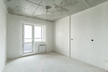 Russia, Moscow- May 21, 2019: interior room apartment. standard repair decoration. rough repair for self-finishing. finishing stage of construction