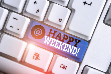 Text sign showing Happy Weekend. Business photo showcasing something nice has happened or they feel satisfied with life White pc keyboard with empty note paper above white background key copy space - obrazy, fototapety, plakaty