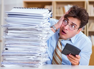 Funny accountant bookkeeper working in the office