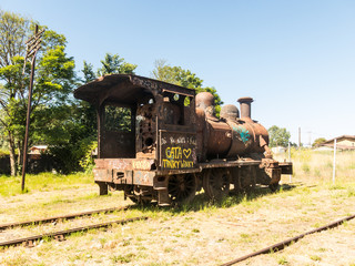 Old abandoned steam locomotive at the train station in the city of Valdivia. Chile