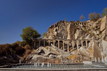 Fototapeta premium Ancient structure in the rocks with fountains in Plovdiv