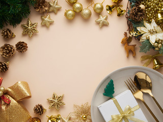 Christmas dinner table setting with gold decorations