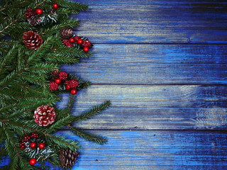 christmas decoration and garland lights on vintage wooden background