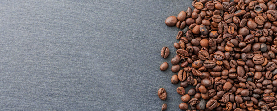 Fresh Roasted Coffee Beans On Blue Stone Table, Copy Space