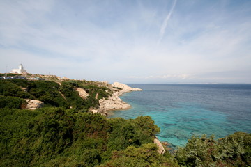 beautiful view of the crystal clear sea of the coast of Sardinia near the red island