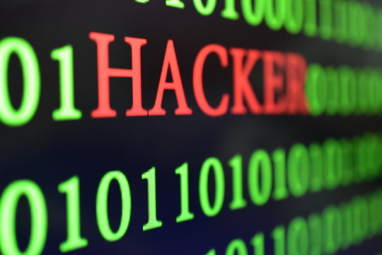 green binary code wording number with Hacker wording in red color