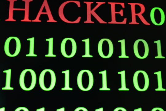 green binary code wording number with Hacker wording in red color - Powered by Adobe