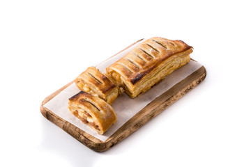 Traditional homemade apple strudel slice isolated on white background