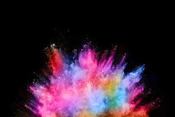 abstract colored dust explosion on a black background.abstract powder splatted background,Freeze...