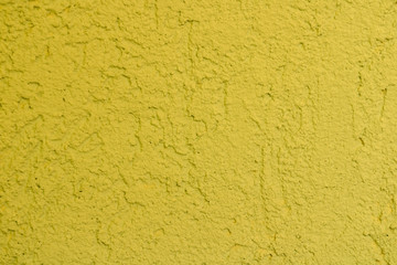 texture of yellow decorative plaster background or concrete paint wall , abstract grain stucco backgroung for wallpaper design
