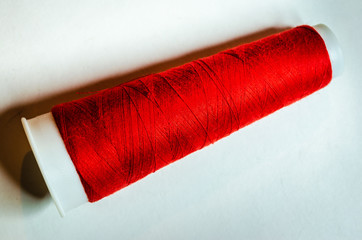 Close-up of a Single large spool of red thread