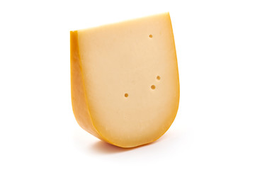Hard Dutch gouda cheese, isolated on white background