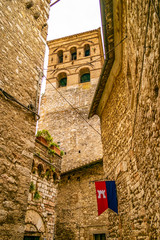 View on old palace with medieval flag in the village of Narni, Umbria - Italy