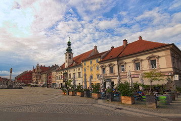 Maribor, Slovenia-September 23, 2019: Panoramic view medieval buildings against vibrant autumn sky. The Rotovz Town Hall Square in Maribor. Famous touristic place and travel destination in Slovenia
