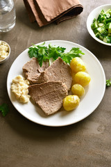 Boiled beef with potatoes and horseradish