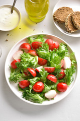 Radish salad with lettuce leaves
