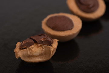 tooth mark on toffee with black background