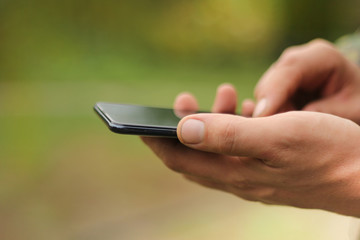 a man uses a smartphone. modern technologies in everyday life.