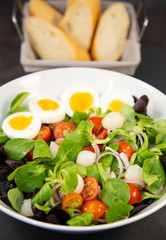 Salad egg mixed with spinach tomatoes, meal food delicious diet for healthy.