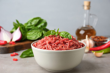 Fresh raw minced meat on light table