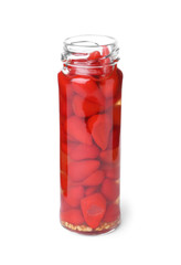 Jar with pickled hot peppers on white background