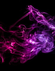 Colored smoke on black background