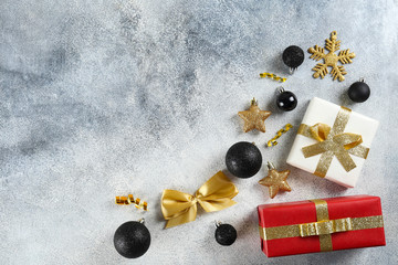 Christmas mood concept. Layout composition with traditional festive attributes, presents in vintage style wrapping. Winter holidays season. Background, copy space, close up, top view, flat lay.