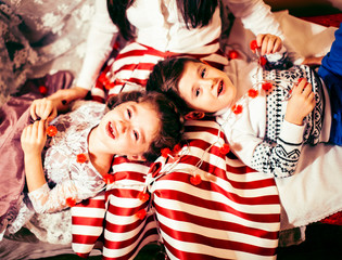 cute family at Christmas, mother son and daughter together having fun, lifestyle people at holiday