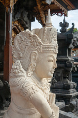 Face sculpture in the Hindu 'Pura Segara' temple at Lembongan, Bali, IDN