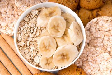 healthy breakfast. Ingredients. Oatmeal with banana, cookies, crisp bread