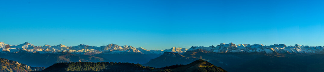 Fototapeta premium Panorama landscape view of Alps in Switzerland from the top of Rigi Kulm on twilight time.