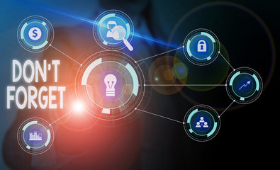 Obraz premium Text sign showing Don T Forget. Business photo showcasing Know by Heart Think Back Fix in the Mind Refresh Memory Woman wear formal work suit presenting presentation using smart device