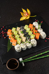 tasty sushi on the black background