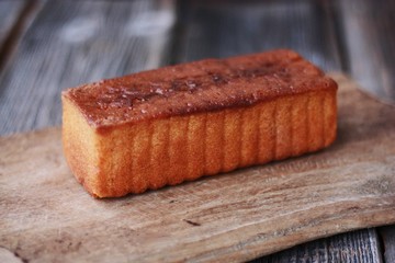Delicious cake with jam on the table