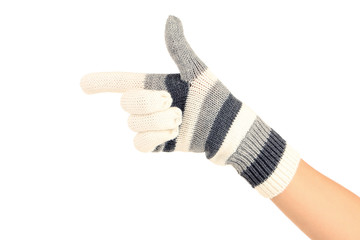 Hand in knitted mitten on white background