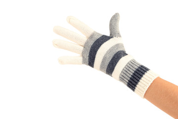 Hand in knitted mitten on white background