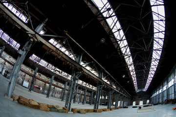 Empty factory building or warehouse building with concrete floor for industry background.