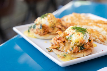 Salmon eggs benedict. A Pacific Northwest spin on a classic breakfast item. Delicious and fresh salmon, eggs, hollandaise sauce, and English muffins for breakfast or brinch.