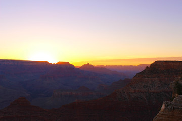 Fototapeta na wymiar Purple Sunset over the Grand Canyon Arizona - American Desert