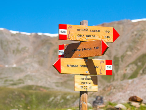 Directional Trail Signs in Stelvio National park near Pizzini, Casati and Branca refuges, Valtellina, Italy