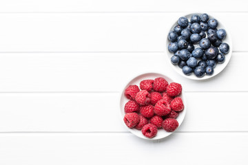 Blueberries and raspberries. Tasty mix of berries.