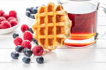 Waffles with blueberries and raspberries.