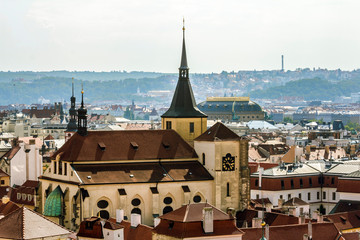 Obraz premium View from the height of the roofs and towers in Prague.